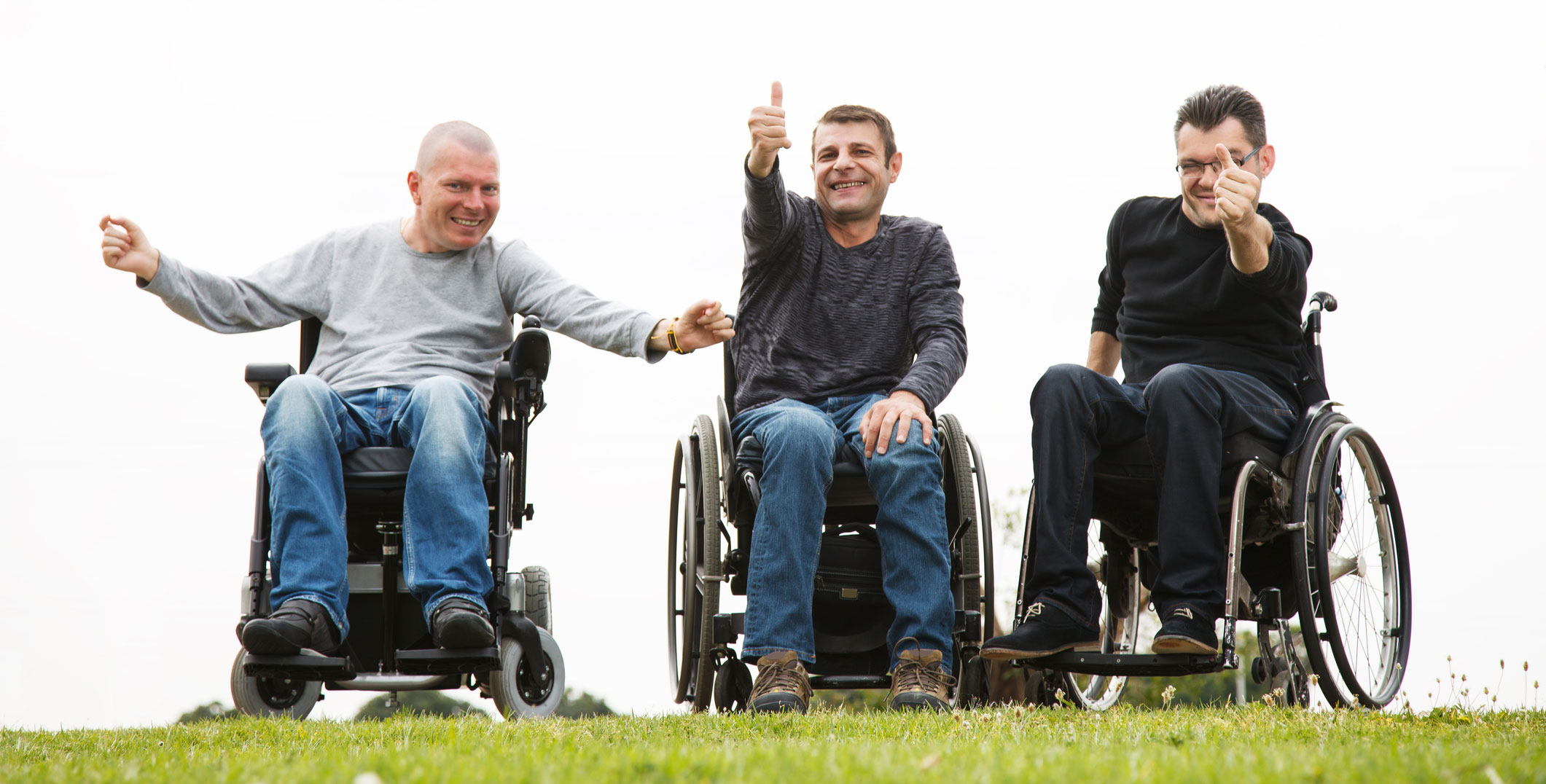 3 friends in wheelchairs